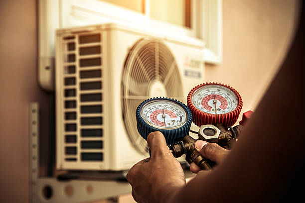 Professional Heat Pump Repair technician working in Saint Hedwig, TX